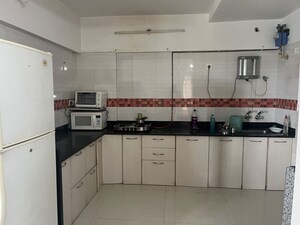 Kitchen in 2 BHK Apartment at Uttam Townscapes, Yerawada – for Rent