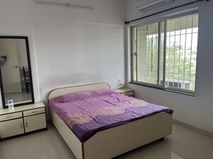 Bedroom in 2 BHK Apartment at Uttam Townscapes, Yerawada – for Rent