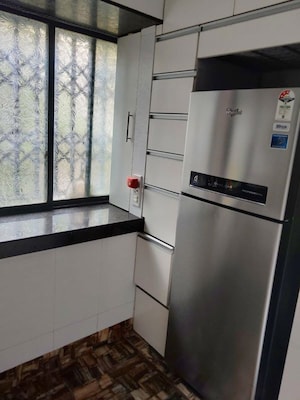 Kitchen in 2 BHK Apartment at Jumbo Darshan, Andheri East – for Rent