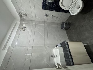 Bathroom in 3 BHK Apartment at Sunny Enclave – for Rent