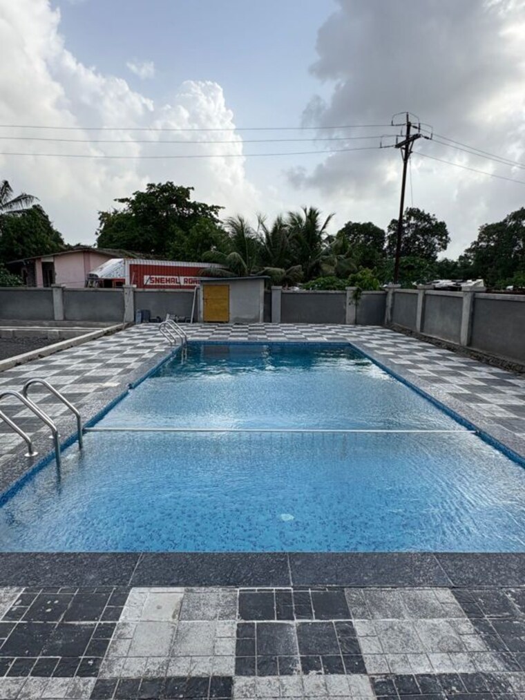 Swimming Pool, om-sai-sarvamangala-residency 1 Bedroom 650 Sq.Ft. Apartment In Chouk Navi Mumbai 10485604