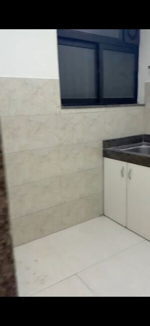 Kitchen in 2 BHK Apartment at Sunteck City Avenue 2, Goregaon West – for Sale