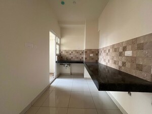 Kitchen in Studio Apartment at Puravankara Silversands, Mundhwa – for Rent