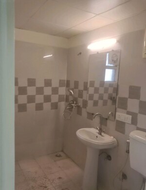 Bathroom in 3 BHK Apartment at Gaur Atulyam Gravity, Omicron I Greater Noida – for Rent