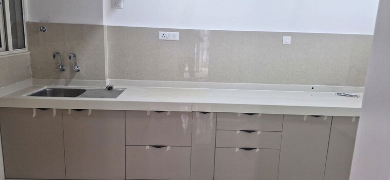 Kitchen, divine-palm-springs 1 Bedroom 450 Sq.Ft. Apartment In Wakad Pune 10487301