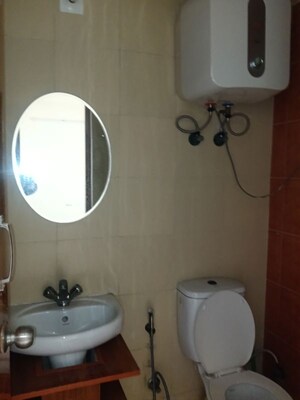 Bathroom in 3 BHK Apartment at Mahagun Mywoods, Sector 16c Greater Noida – for Rent