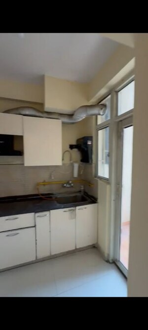Kitchen in 2 BHK Apartment at M R Platinum 321, Raj Nagar Extension – for Rent