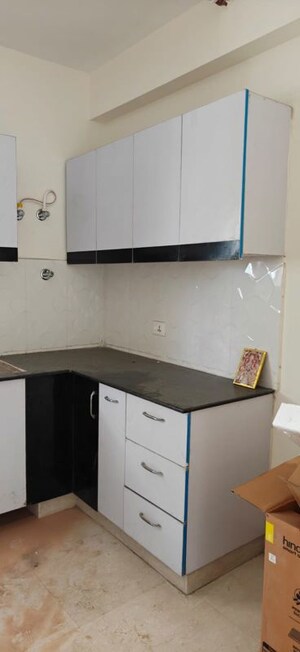 Kitchen in 3 BHK Apartment at Ansal Crown Heights, Sector 80 – for Rent
