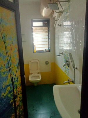 Bathroom in 1 BHK Apartment at Lokhandwala Whispering Palms, Kandivali East – for Rent