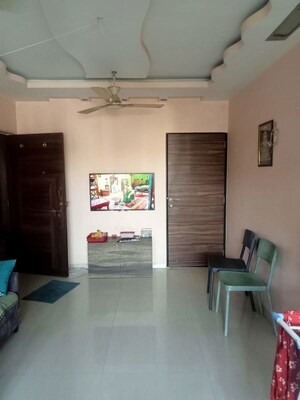 Living Room in 1 BHK Apartment at Lokhandwala Whispering Palms, Kandivali East – for Rent