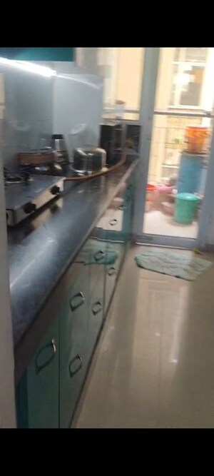 Kitchen in 2 BHK Apartment at Proview Officer City 2, Raj Nagar Extension – for Rent
