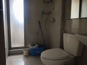 Bathroom in 1 BHK Apartment at Hiranandani Lavinia, Ghodbunder Road – for Rent