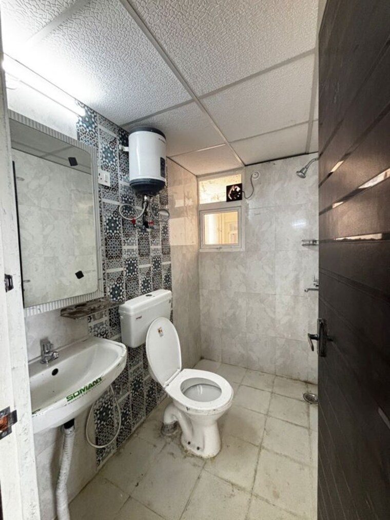 Bathroom, signature-global-the-millennia 2 Bedroom 920 Sq.Ft. Apartment In Sector 37d Gurgaon 10487845