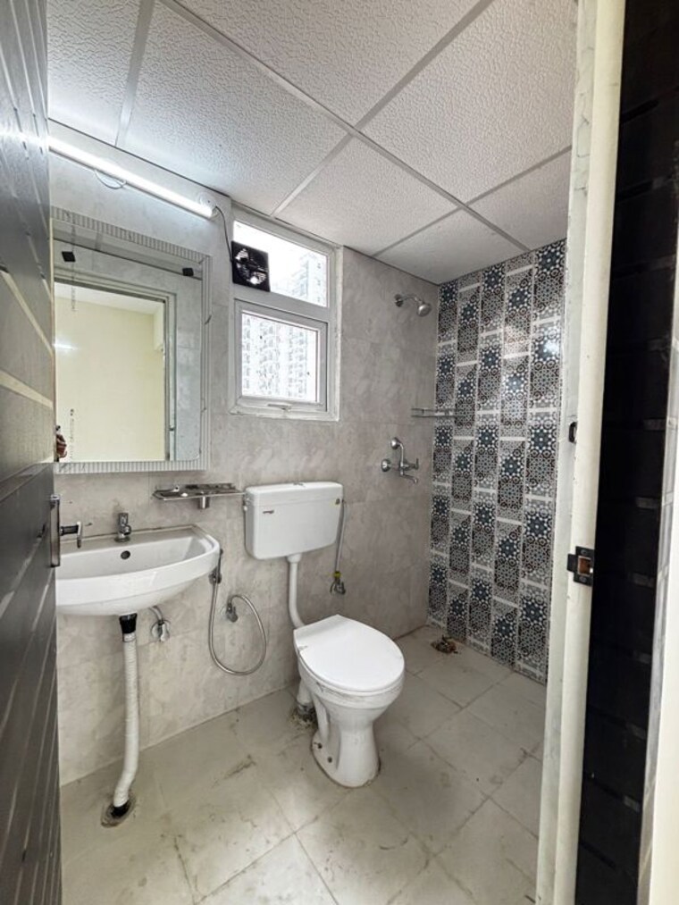 Bathroom, signature-global-the-millennia 2 Bedroom 920 Sq.Ft. Apartment In Sector 37d Gurgaon 10487845