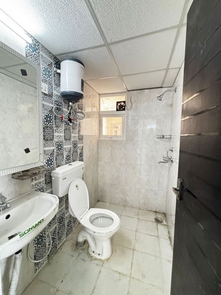 Bathroom, signature-global-the-millennia 2 Bedroom 920 Sq.Ft. Apartment In Sector 37d Gurgaon 10487845