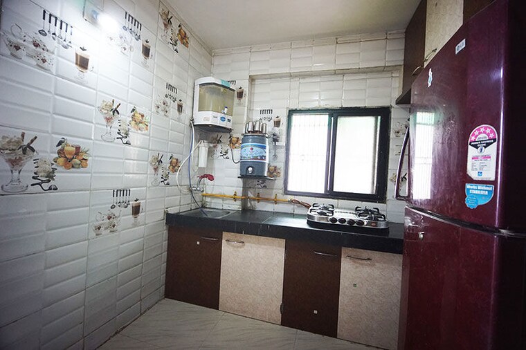 Kitchen, bodakdev 2 Bedroom 90 Sq.Yd. Apartment In Bodakdev Ahmedabad 10486658