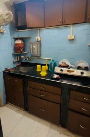 Kitchen in 2 BHK Apartment at Cliff End CHS, Andheri East – for Rent
