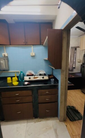 Kitchen in 2 BHK Apartment at Cliff End CHS, Andheri East – for Rent