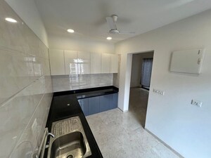Kitchen in 2.5 BHK Apartment at Rama Metro Life Maxima Residences, Tathawade – for Rent