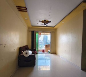 Living Room in 2 BHK Apartment at Shree Tirupati Darshan CHS, Kalyan West – for Rent