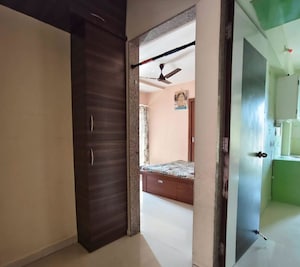 Building Lobby in 2 BHK Apartment at Shree Tirupati Darshan CHS, Kalyan West – for Rent