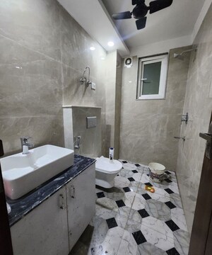 Bathroom in 2 BHK Builder Floor at Freedom Fighters Enclave – for Rent