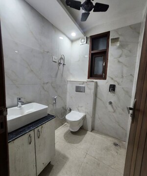 Bathroom in 2 BHK Builder Floor at Freedom Fighters Enclave – for Rent