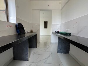 Kitchen in 2 BHK Apartment at Raymond Ten X Habitat, Pokhran Road No Two – for Rent