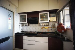 Kitchen in 2 BHK Apartment at Nava Naroda – for Sale