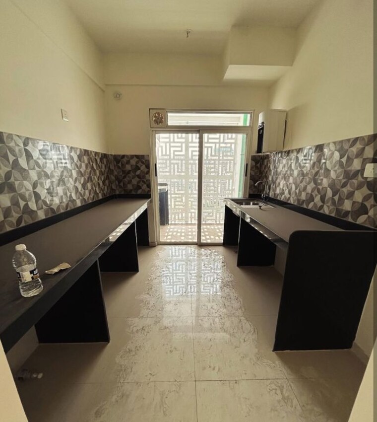 Kitchen, lodha-bella-vita 3.5 Bedroom 1350 Sq.Ft. Apartment In Nibm Road Pune 10488056