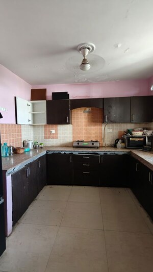 Kitchen in 3 BHK Apartment at Ansal Housing Woodbury, Patiala Road – for Rent