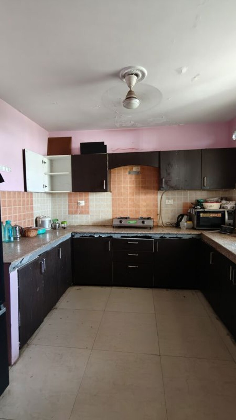 Kitchen, ansal-housing-woodbury 3 Bedroom 2000 Sq.Ft. Apartment In Patiala Road Zirakpur 10488115