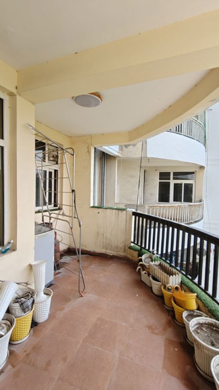 Kitchen, ansal-housing-woodbury 3 Bedroom 2000 Sq.Ft. Apartment In Patiala Road Zirakpur 10488115
