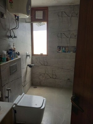 Bathroom in 2 BHK Apartment at Dwarka – for Rent
