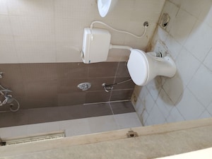 Bathroom in 2 BHK Apartment at Shapoorji Pallonji Vanaha Golfland, Bavdhan – for Rent