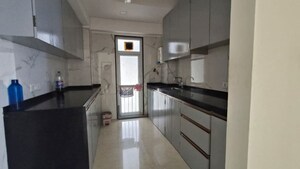 Kitchen in 2 BHK Apartment at Ruparel Ariana, Parel – for Rent
