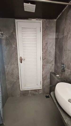 Bathroom in 2 BHK Apartment at Ruparel Ariana, Parel – for Rent