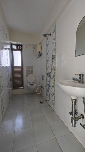Bathroom in 2 BHK Apartment at Lashkaria Green Height, Jogeshwari West – for Rent