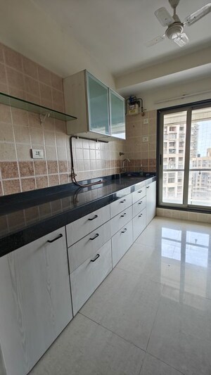 Kitchen in 2 BHK Apartment at Lashkaria Green Height, Jogeshwari West – for Rent