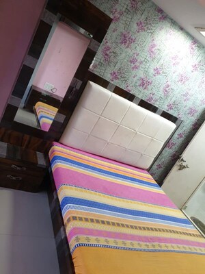 Bedroom in 2 BHK Apartment at New Mhada Towers, Andheri West – for Rent