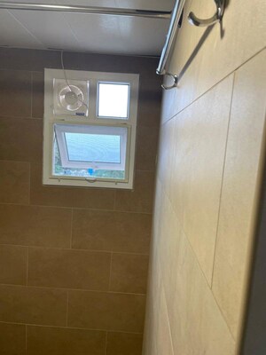 Bathroom in 1 BHK Apartment at Prestige Primrose Hills Phase II, Banashankari 6th Stage – for Rent