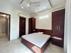 Bedroom in 4 BHK Builder Floor at Sushant Lok I – for Rent