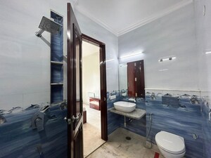 Bathroom in 4 BHK Builder Floor at Sushant Lok I – for Rent