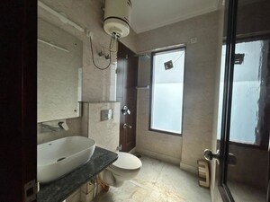 Bathroom in 4 BHK Builder Floor at Sushant Lok I – for Rent