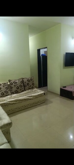 Living Room in 2 BHK Apartment at Rustomjee Urbania, Thane West – for Sale