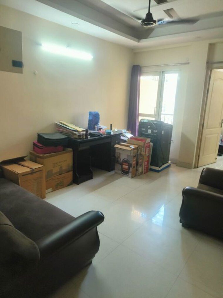 Living Room, maxblis-grand-wellington 1 Bedroom 615 Sq.Ft. Apartment In Sector 75 Noida 10488610