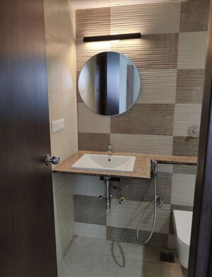 Bathroom in 3 BHK Apartment at Bhartiya City Nikoo Homes 4, Thanisandra Main Road – for Rent