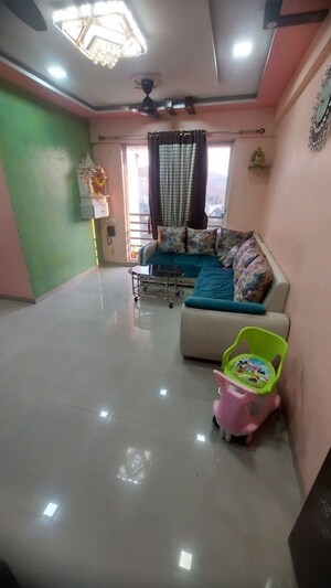 Living Room in 2 BHK Apartment at Sahil Pride Residency Daffodil, Kasarvadavali – for Sale
