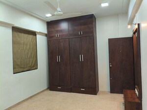 Room in 2 BHK Apartment at Maya Mahal, Khar West – for Rent