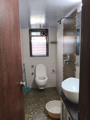Bathroom in 2 BHK Apartment at Maya Mahal, Khar West – for Rent
